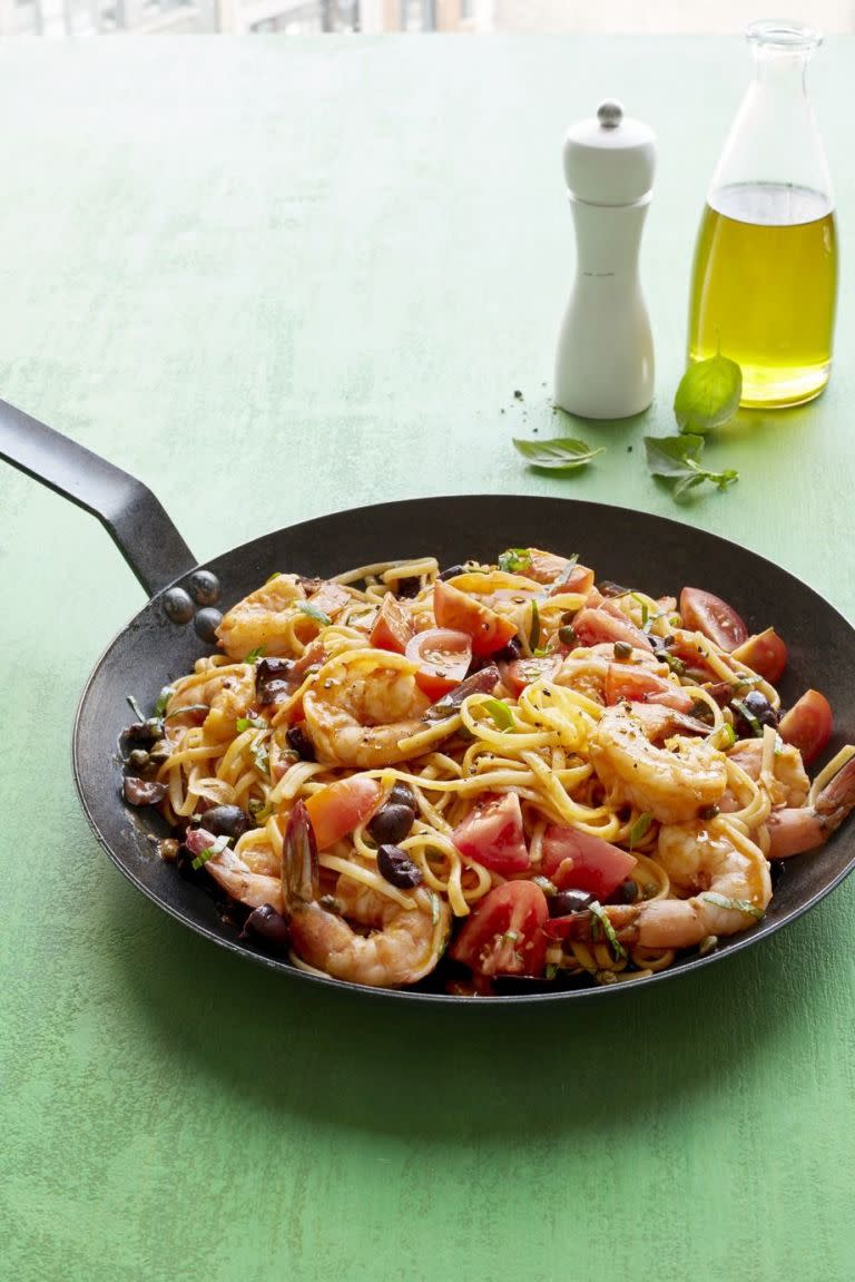 <p>Serve up some delicious pasta in under 20 minutes.</p><p><a rel="nofollow noopener" href="http://www.womansday.com/food-recipes/food-drinks/recipes/a54440/shrimp-linguine-puttanesca-recipe/" target="_blank" data-ylk="slk:Get the recipe." class="link "><strong>Get the recipe.</strong></a> </p>