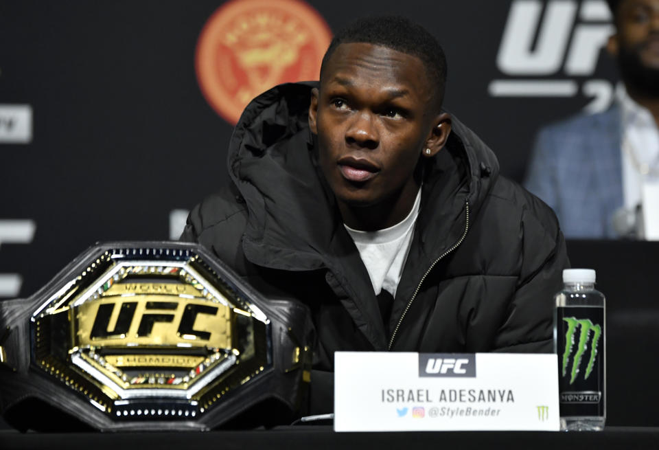 LAS VEGAS, NEVADA - MARCH 04: Israel Adesanya of Nigeria interacts with media at UFC APEX on March 04, 2021 in Las Vegas, Nevada. (Photo by Jeff Bottari/Zuffa LLC)