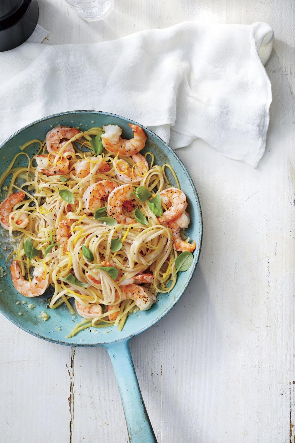 <p><b>Recipe: <a href="https://www.southernliving.com/recipes/easy-shrimp-scampi" rel="nofollow noopener" target="_blank" data-ylk="slk:Easy Shrimp Scampi with Basil;elm:context_link;itc:0;sec:content-canvas" class="link ">Easy Shrimp Scampi with Basil</a></b></p> <p>Shrimp is such a quick-cooking shellfish, it's easy to accomplish for a weeknight dinner. Use the shrimp to top a dish of linguine and you've got a sophisticated dinner for two.</p>