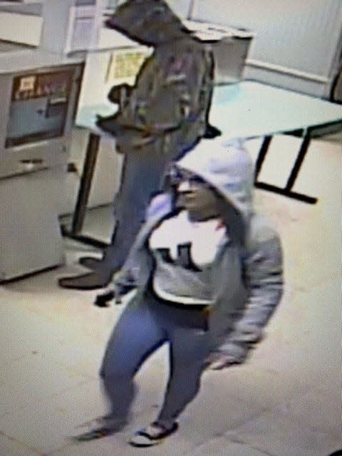 In a handout photo from Gettysburg Police Department, two suspects are seen in camera footage of Dolly's Laundromat in Gettysburg.