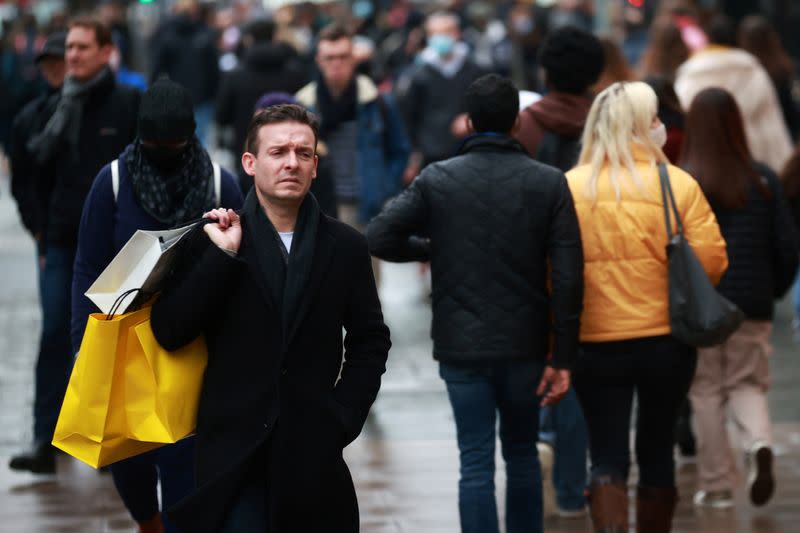 Shoppers walk on Oxford Street in London