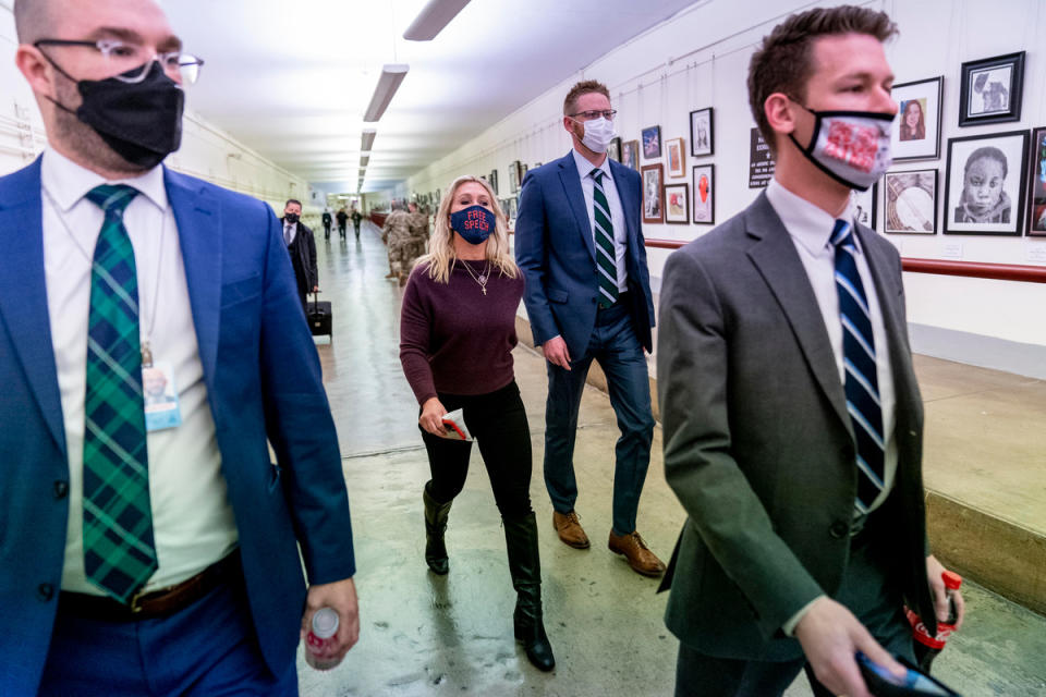 Rep. Marjorie Taylor Greene, R-Ga., walks back to her office after speaking on the floor of the House Chamber on Capitol Hill in Washington, Thursday, Feb. 4, 2021.