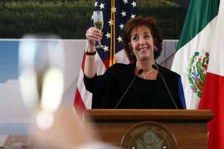U.S. Ambassador to Mexico Roberta S. Jacobson raises her glass in a toast as she attends a ceremony to place the first stone of the new U.S. Embassy in Mexico City, Mexico February 13, 2018. REUTERS/Edgard Garrido