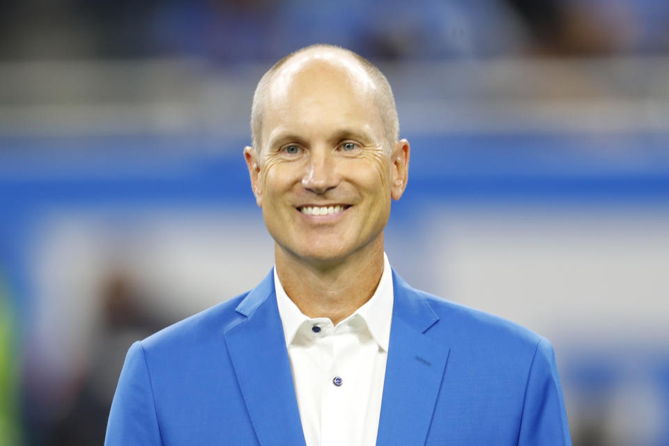 FILE - In this Sept. 29, 2019 file photo former Detroit Lions kicker Jason Hanson appears at halftime during an NFL football game against the Kansas City Chiefs in Detroit. Jason Hanson has paid off a debt and gotten a good laugh. The former NFL kicking great handed a $25 check to Mlive.com Detroit Lions beat writer Kyle Meinke on Sunday at Ford Field and shared a true tale. (AP Photo/Paul Sancya, file)