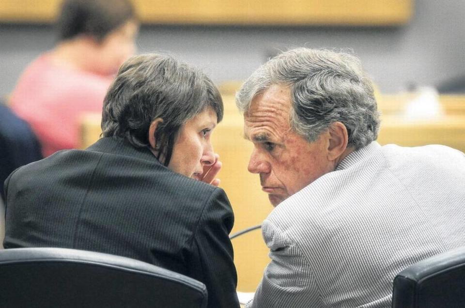 Gaston County District Attorney Locke Bell received Mark Carver’s complete file from his former defense attorney in June, a new court document alleges. Legal experts say that’s a potential violation of state law and legal ethics. Bell is shown in this photograph talking to Assistant District Attorney Stephanie Hamlin during an unrelated case. Hamlin helped convict Carver of murder in 2011.