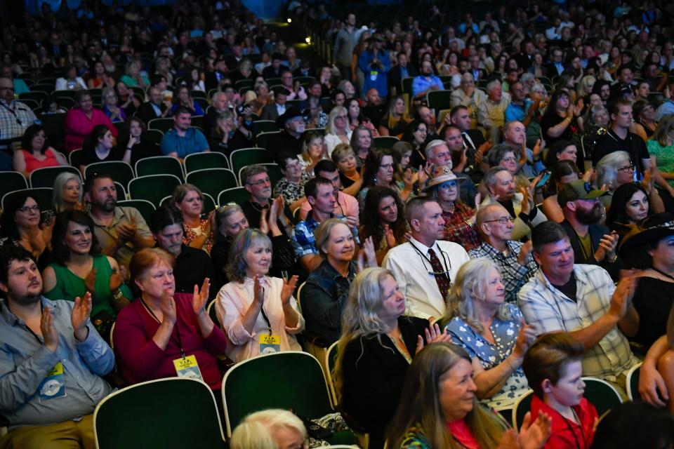 Crowd members clap during the South Carolina Entertainment and Music Hall of Fame after being inducted into the hall of fame at McAlister Auditorium on Thursday, April 25, 2024.