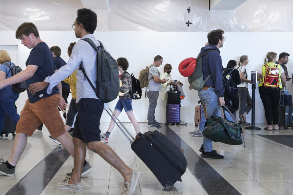 Viajeros en el aeropuerto internacional John F. Kennedy de Nueva York, el 31 de julio de 2022. (Gus Powell/The New York Times)