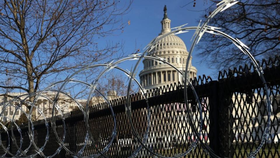 Concertina razor wire is shown along the top of the eight-foot “non-scalable” fence that surrounds the U.S. Capitol, where National Guard troops have been activated to protect against threats surrounding President-elect Joe Biden’s inauguration. (Photo by Chip Somodevilla/Getty Images)