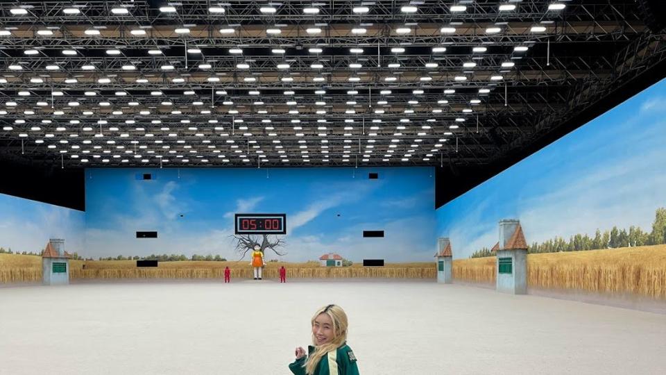 a person standing in an empty arena