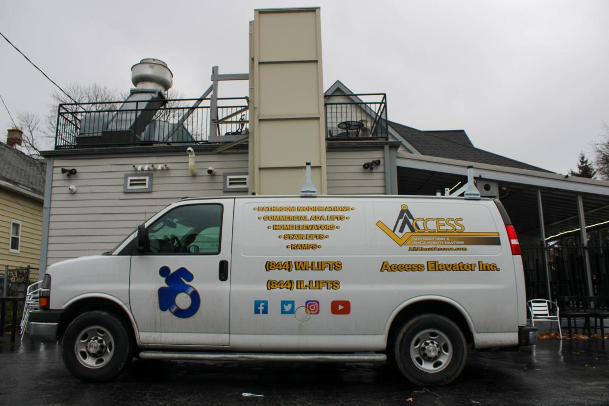 Access arrives at Jewel Currie's building to repair his wheelchair lift on Dec. 5.