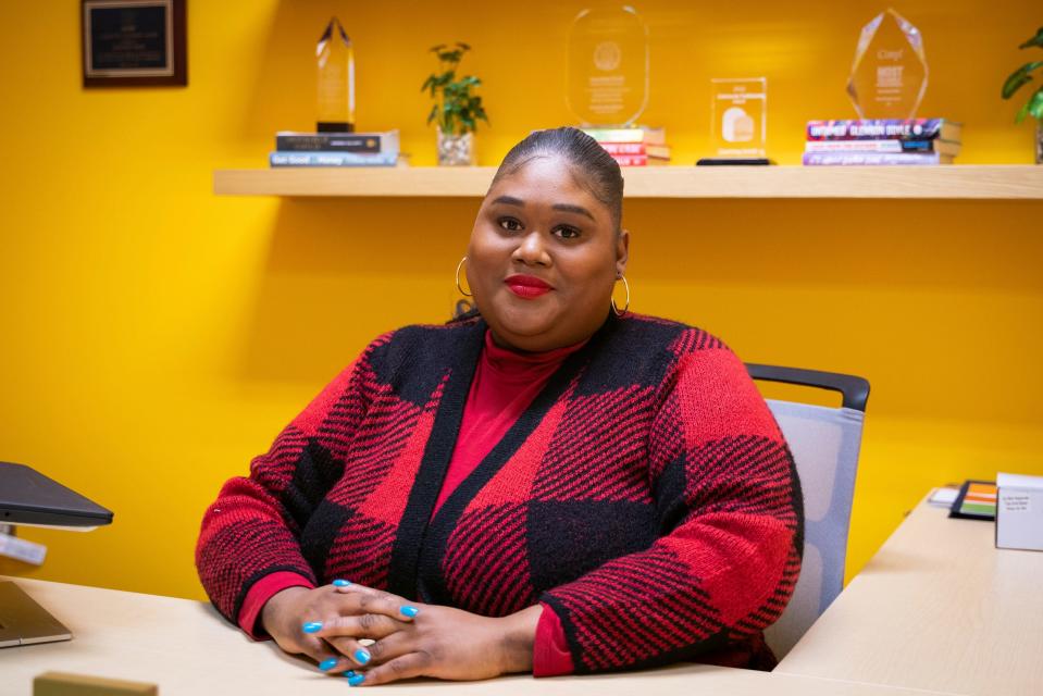 Founder and CEO Courtney Smith sits for a photo at the Detroit Phoenix Center, an organization that provides support for youth facing economic, social, and educational challenges, in Detroit on Dec. 13, 2022.