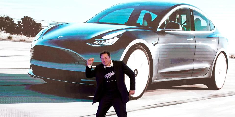 Tesla Inc CEO Elon Musk dances onstage during a delivery event for Tesla China-made Model 3 cars in Shanghai