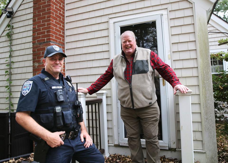 Brentwood resident David Eldridge comes out of his home to say thanks to officer Bob McConn for delivering his McDonald’s, DoorDash food delivery. McConn took over the delivery after the original driver was arrested for a suspended license.