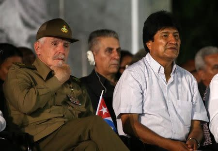 Cuba's Commander of the Revolution Ramiro Valdes and Bolivia's President Evo Morales (R) attend a tribute in honor of former Cuban leader Fidel Castro in Santiago de Cuba, Cuba, December 3, 2016. REUTERS/Carlos Barria