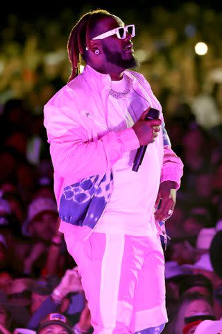 <p>Amy Sussman/Getty</p> T-Pain performs with Jelly Roll at the T-Mobile Mane Stage during Stagecoach in April 2024