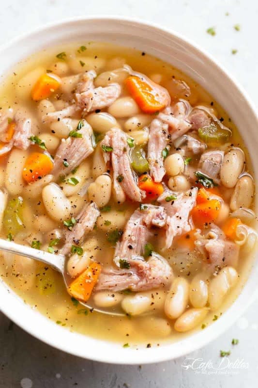 <p>Cafe Delites</p><p>Quick and easy ham and bean soup recipe is ready in 15 minutes. loaded with cannellini or navy bean with tender leftover ham in every bite!</p><p><strong>Get the recipe: <a href="https://cafedelites.com/ham-bean-soup/" rel="nofollow noopener" target="_blank" data-ylk="slk:Ham and Bean Soup;elm:context_link;itc:0;sec:content-canvas" class="link "><em>Ham and Bean Soup</em></a></strong></p>