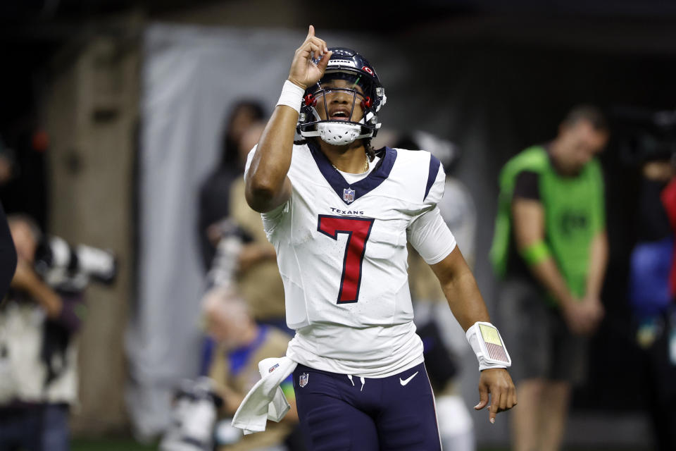 Houston Texans quarterback C.J. Stroud celebrates after throwing a touchdown pass in the first half of a preseason NFL football game against the New Orleans Saints, Sunday, Aug. 27, 2023, in New Orleans. (AP Photo/Butch Dill)