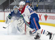 Montreal Canadiens right wing Joel Armia (40) fails to get a shot past Vancouver Canucks goaltender Braden Holtby (49) during the third period of an NHL hockey game Wednesday, Jan. 20, 2021, in Vancouver, British Columbia. (Jonathan Hayward/The Canadian Press via AP)