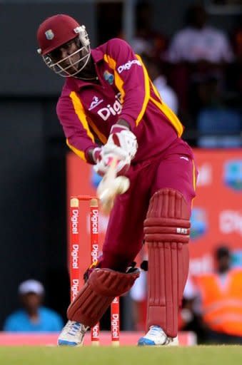 West Indies cricketer Darren Sammy plays a shot during the fifthof five one-day international (ODI) between West Indies and Australia at the Beausejour Cricket Ground in Gros Islet, St. Lucia. West Indies' hopes of a first series win over Australia in 17 years were shattered on Sunday when the tourists clinched a 30-run victory in a thrilling fifth and final one-dayer