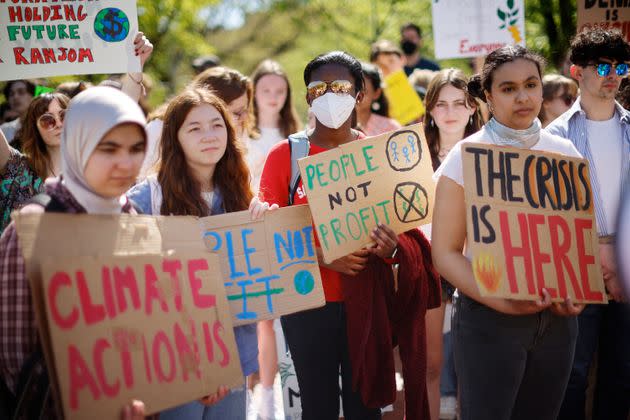 Young climate activists stage rally in Lafayette Park across from the White House on Earth Day on April 22, 2022, in Washington, D.C. Organized by Fridays for Future DC, about 50 young people gathered to protest against the use of fossil fuels.