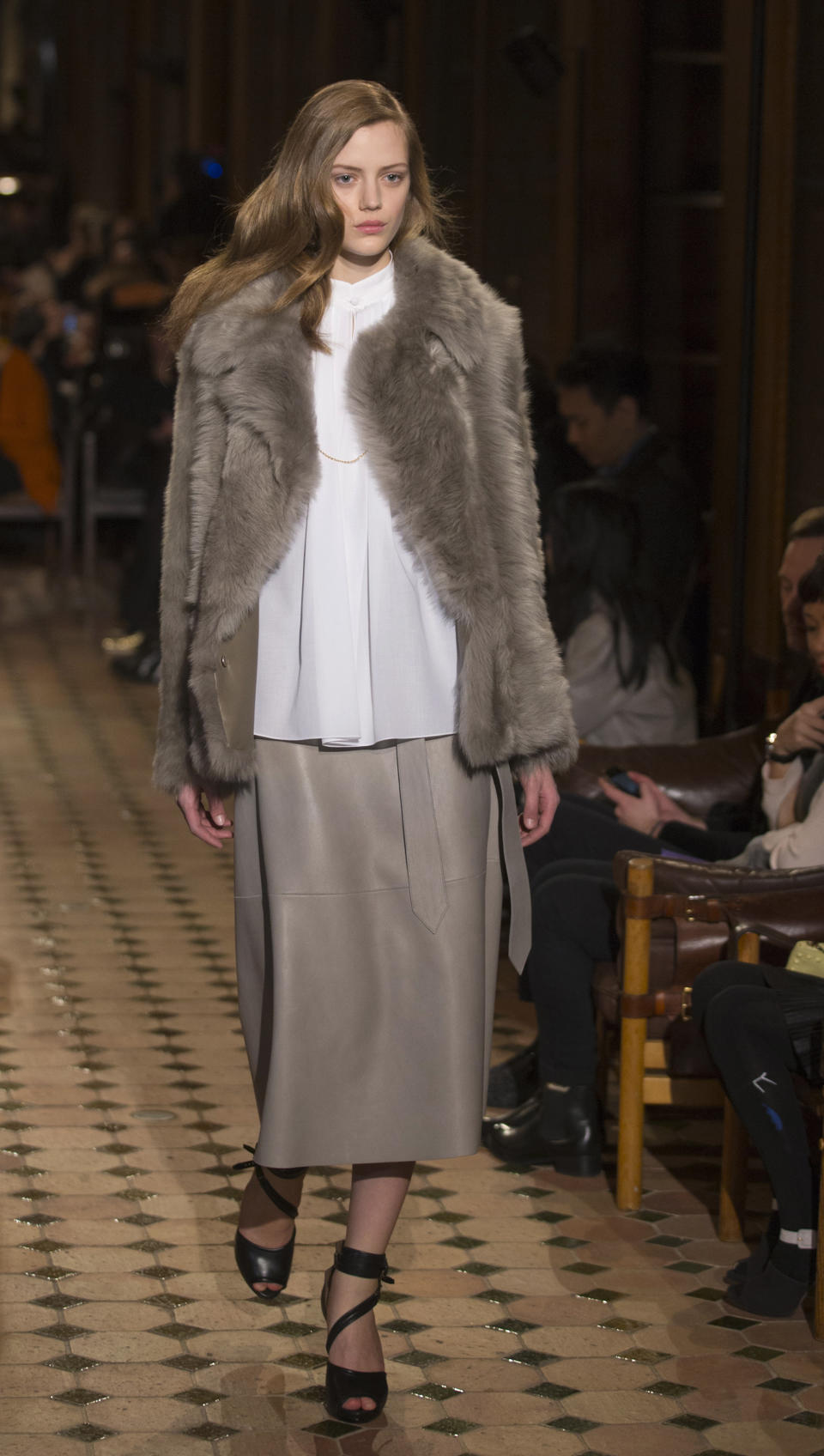 A model wears a creation by French fashion designer Christophe Lemaire for Hermes Ready to Wear's Fall-Winter 2013-2014 fashion collection, presented, Tuesday, March 5, 2013 in Paris. (AP Photo/Jacques Brinon)'s