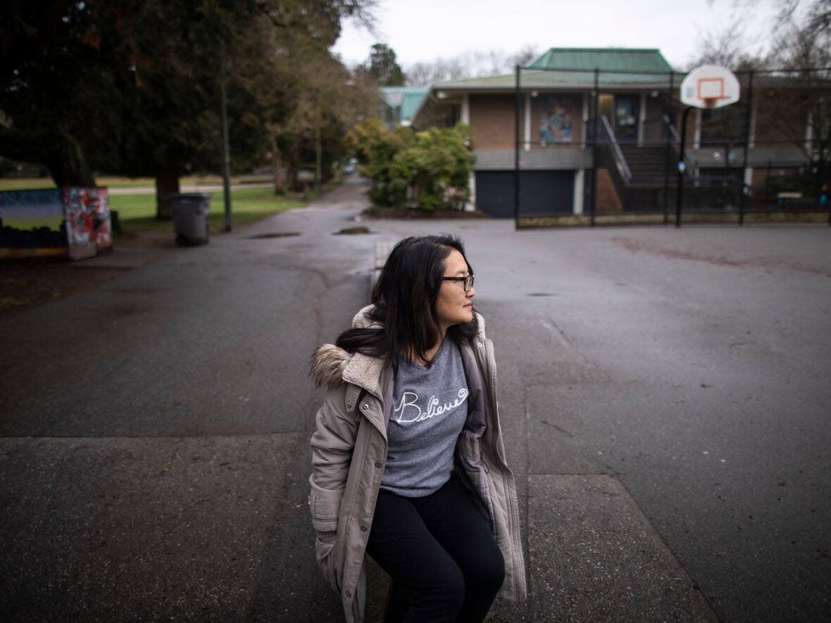 Barbara Lee, pictured here on Jan. 25, received a letter from a lawyer with the Vancouver School Board in 2014 warning of potential legal action for defamation if she continued to raise allegations of financial improprieties at John Norquay Elementary. (Ben Nelms/CBC - image credit)