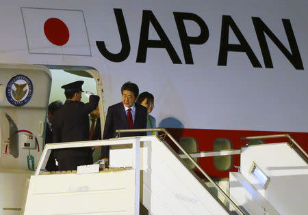 Japanese Prime Minister Shinzo Abe and his spouse Akie Abe arrive ahead of the G20 leaders summit in Buenos Aires, Argentina November 29, 2018. REUTERS/Martin Acosta