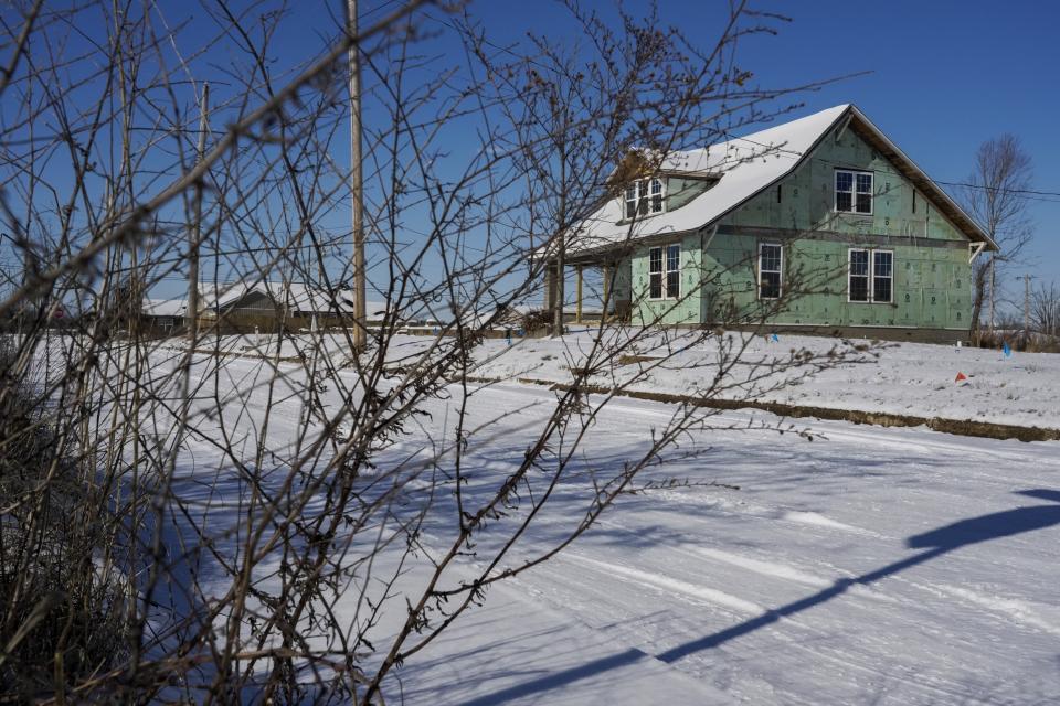 A rebuilt home is under construction on Tuesday, Jan. 16, 2024, in Mayfield, Ky. (AP Photo/Joshua A. Bickel)