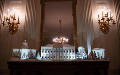 The gingerbread house is made from 100lbs of gingerbread and 20lbs of royal icing - Credit: NICHOLAS KAMM/AFP