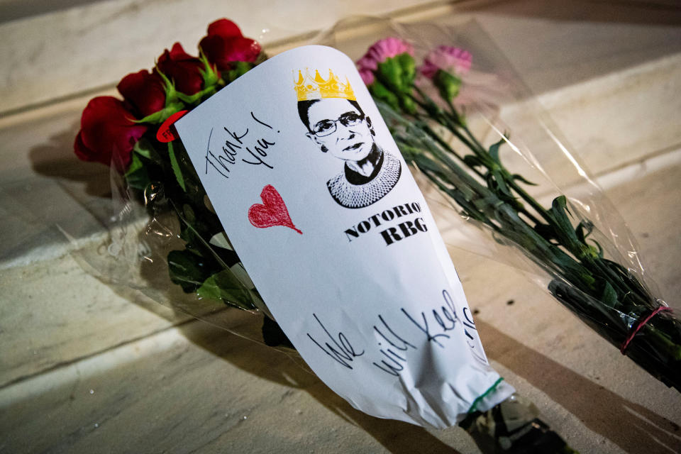 A bouquet of flowers was among one of several left outside the Supreme Court building following Ginsburg's death. (Photo: Alexander Drago /Reuters)