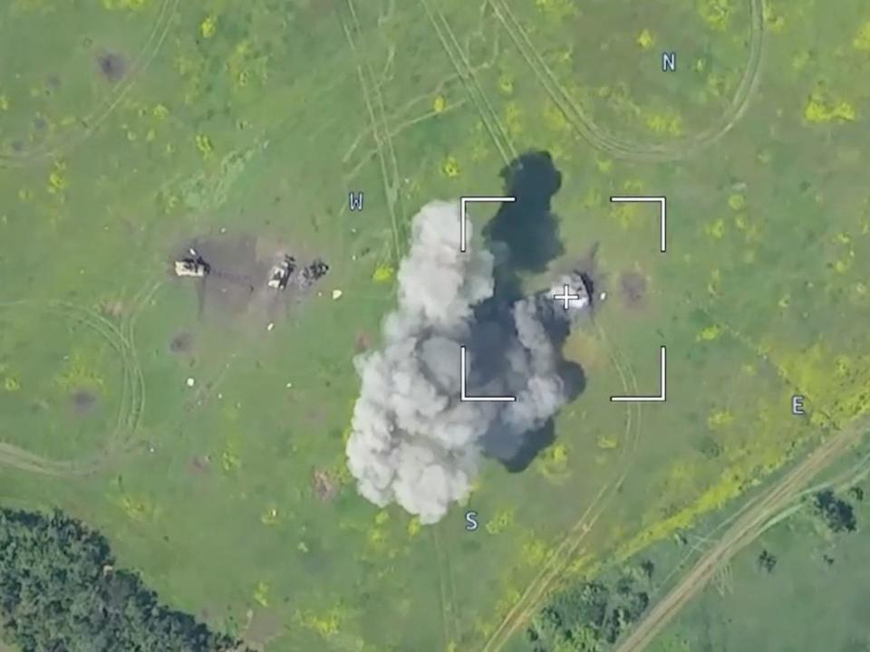 Drone footage shows a burning armoured vehicle in an unidentified location after the Defence Ministry in Moscow said that Russian forces have thwarted a major Ukrainian offensive in the southern Ukrainian region of Donetsk