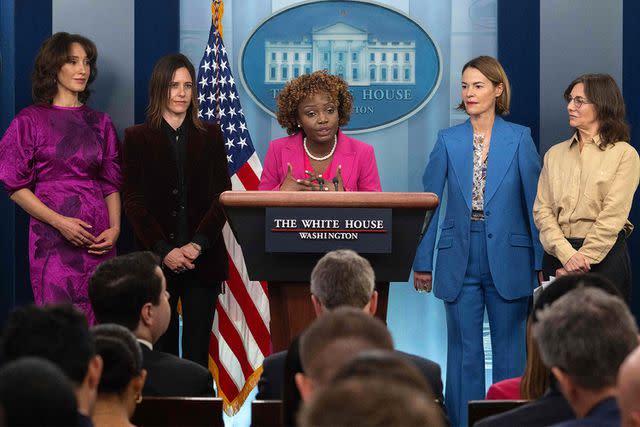 Jim WATSON/AFP/Getty White House Press Secretary Karine Jean-Pierre (C), with "The L Word" Producer Ilene Chaiken (far right) and actresses Leisha Hailey (second from right), Katherine Moennig (second left) and Jennifer Beals (far left), speaks during the daily press briefing at the White House in Washington, DC, on April 25, 2023