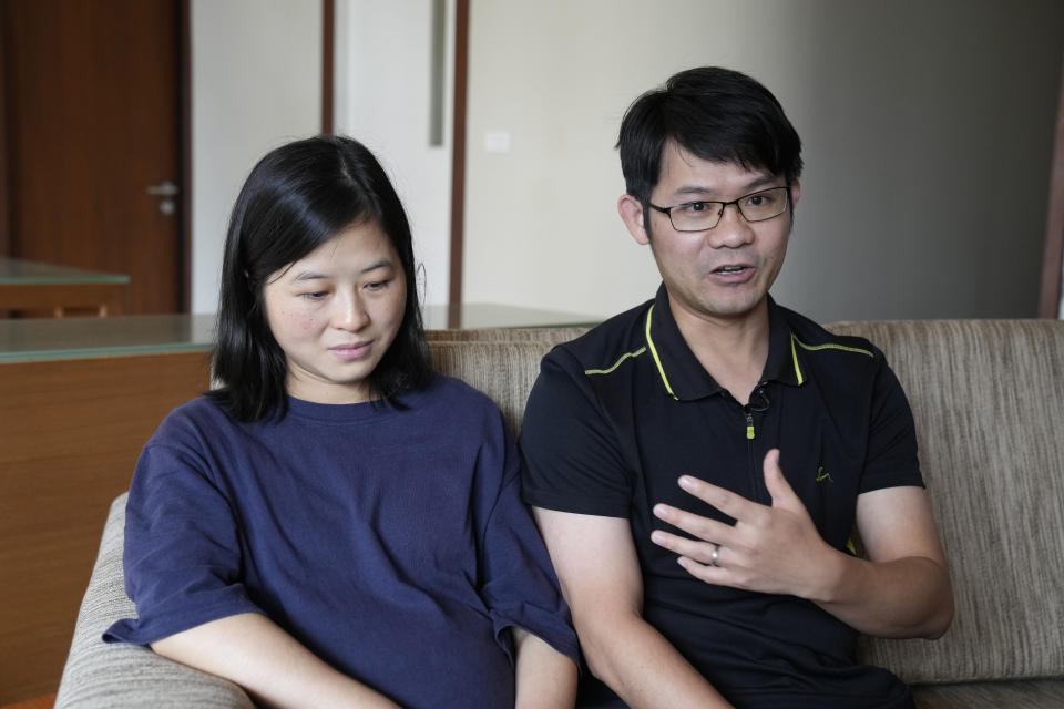 Chinese nationals Li Bin Bin and his wife Nie Yunfeng talk to The Associated Press during an interview in Bangkok, Thailand, Tuesday, Sept. 6, 2022, Li and Nie are part of a group belonging to a Chinese church that are seeking refuge in Thailand, saying they face state harassment and possible deportation. (AP Photo/Sakchai Lalit)