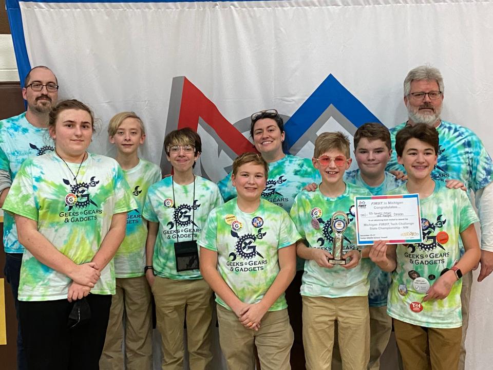 Members of G3: Geeks, Gears and Gadgets pose after winning the Think Award at the Pellston competition.