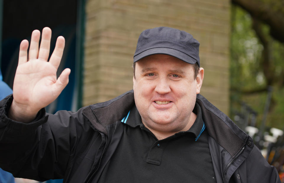 Comedian Peter Kay waves as he launches the Coulam Wheelyboat V17, a purpose-built fully wheelchair accessible powerboat at the Anderton Centre located on the banks of the Lower Rivington Reservoir near Bolton in Lancashire. Picture date: Saturday April 23, 2022. (Photo by Peter Byrne/PA Images via Getty Images)