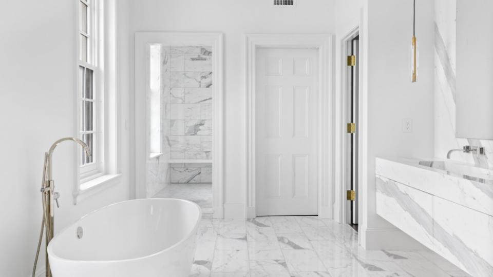 A bathroom featuring marble - Credit: Douglas Elliman