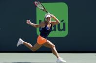 Mar 26, 2017; Miami, FL, USA; Angelique Kerber of Germany hits a forehand against Shelby Rogers of the United States (not pictured) on day six of the 2017 Miami Open at Crandon Park Tennis Center. Kerber won 6-4, 7-5. Mandatory Credit: Geoff Burke-USA TODAY Sports