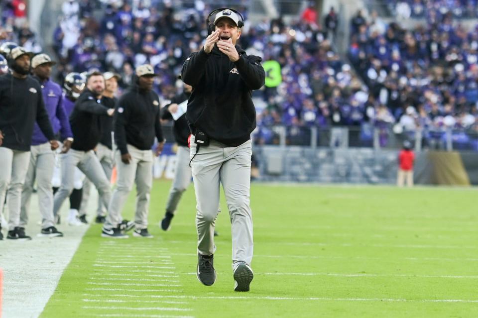 Baltimore Ravens head coach John Harbaugh call as time out in the second half against the Cleveland Browns.