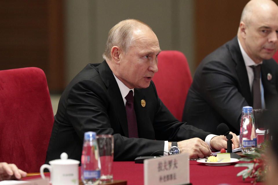 Russian President Vladimir Putin talks with Chinese President Xi Jinping, unseen, during the meeting in Beijing Friday, April 26, 2019. (Kenzaburo Fukuhara/Pool Photo via AP)