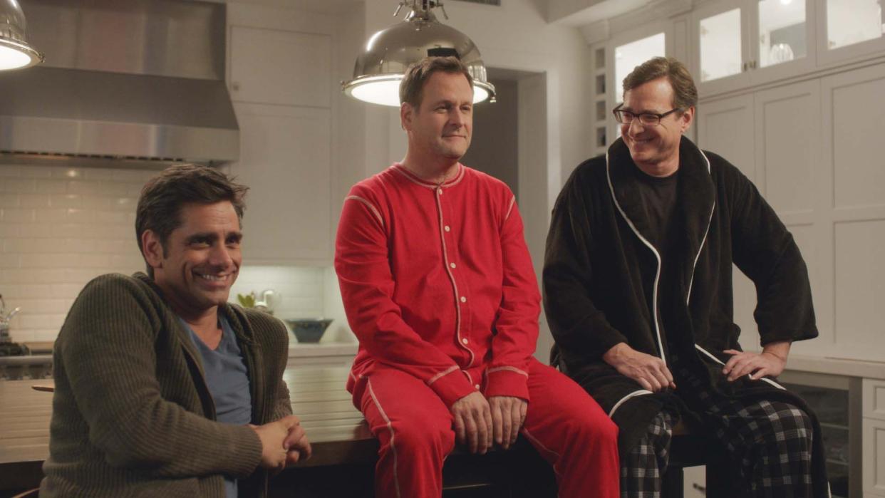 "Full House" co-stars John Stamos, left, Dave Coulier and Bob Saget reunite on set for a Dannon Oikos Greek Yogurt commercial during the Super Bowl in 2014.