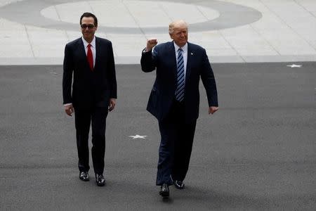 U.S. President Donald Trump arrives for a signing ceremony with Treasury Secretary Steve Mnuchin at the Treasury Department in Washington, U.S., April 21, 2017. REUTERS/Aaron P. Bernstein