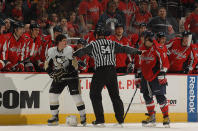 <p>A referee separates Alex Ovechkin #8 of the Washington Capitals and Sidney Crosby #87 of the Pittsburgh Penguins in front of the Washington Capitals bench during a NHL hockey game on February 22, 2009 at the Verizon Center in Washington DC. (Photo by Mitchell Layton/NHLI via Getty Images) </p>