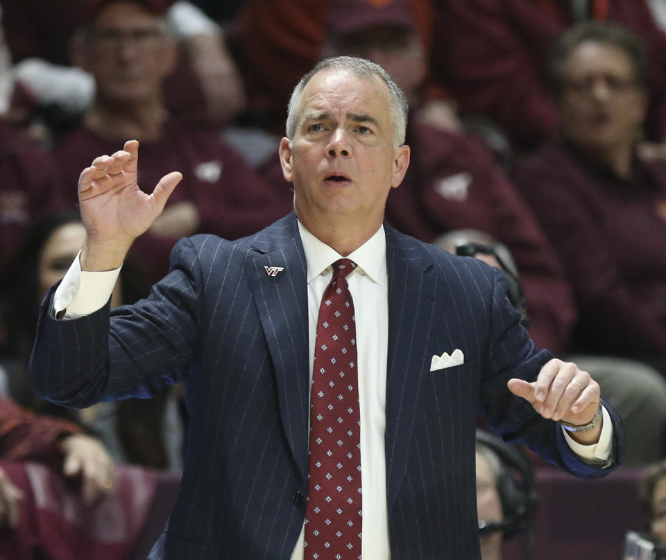 Virginia Tech head coach Mike Young looks on from the bench during the first half of an NCAA college basketball game against Syracuse in Blacksburg Va., Saturday, Jan. 18 2020. (Matt Gentry/The Roanoke Times via AP)