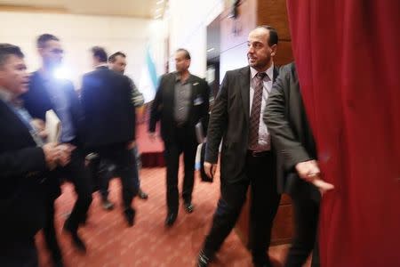 Head of the Syrian High Negotiations Committee (HNC) opposition group Nasr al-Hariri leaves after his address to the media aside of the Intra-Syria peace talks in Geneva, Switzerland, February 25, 2017. REUTERS/Pierre Albouy