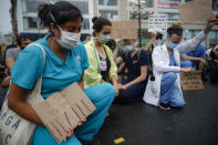 Medical professionals join a protest rally at Union Square, Friday, June 5, 2020, in the Manhattan borough of New York. Protests continued following the death of George Floyd, who died after being restrained by Minneapolis police officers on May 25. (AP Photo/John Minchillo)