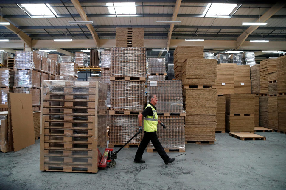 UK firms A staff member works at PALLITE, a designer and manufacturer of social distancing screens and desks from recyclable paper board, amid the outbreak of the coronavirus disease (COVID-19), in Wellingborough, Britain, July 20, 2020. REUTERS/Andrew Boyers