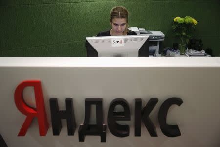 An employee works at Yandex headquarters in Moscow December 2, 2014. REUTERS/Maxim Zmeyev