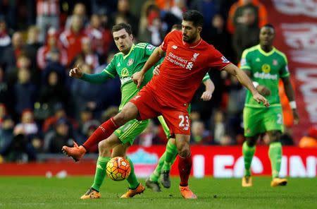 Football Soccer - Liverpool v Sunderland - Barclays Premier League - Anfield - 6/2/16 Liverpool's Emre Can in action with Sunderland's Adam Johnson Reuters / Phil Noble Livepic