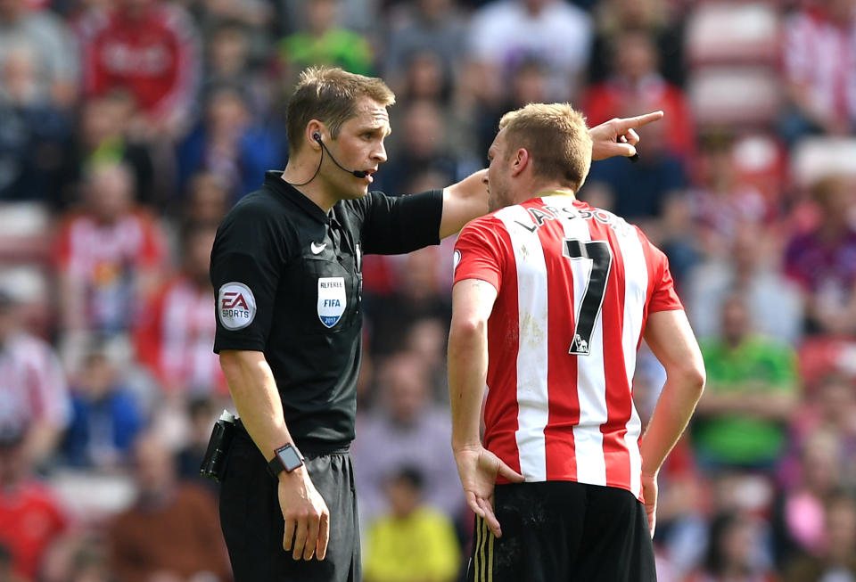 Craig Pawson shows Larsson where the showers are after his X-rated challenge