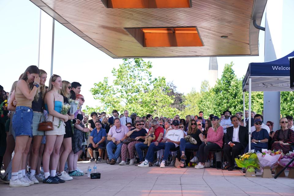 The families of Grace Kumar and Barnaby Webber (seated front) attend a vigil at the University of Nottingham after they and Ian Coates were killed and another three hurt in connected attacks on Tuesday morning. Picture date: Wednesday June 14, 2023.